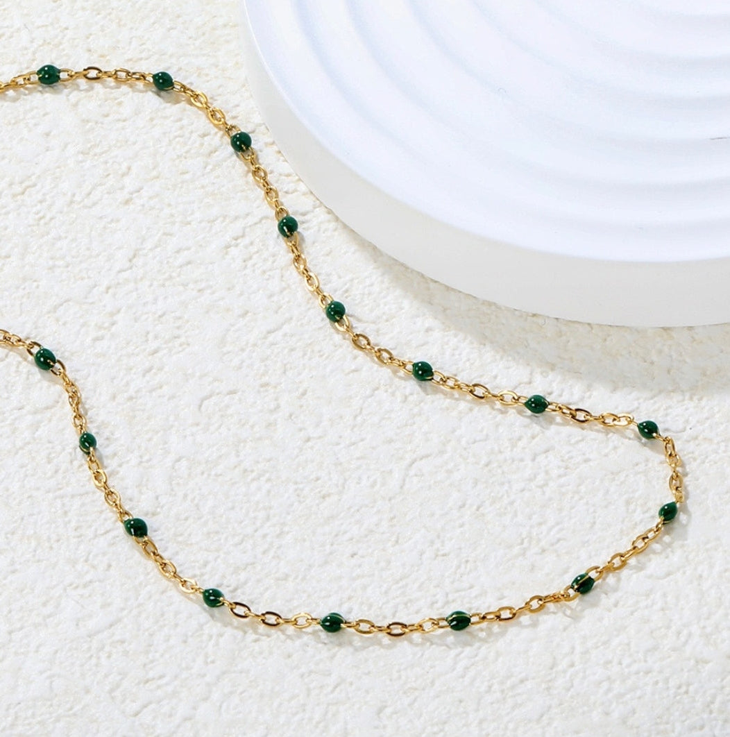 Gold Chain Necklace Features Small Green Beads